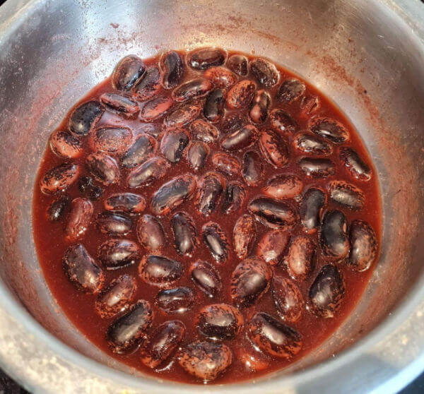These beans contain tannins that colour the cooking water